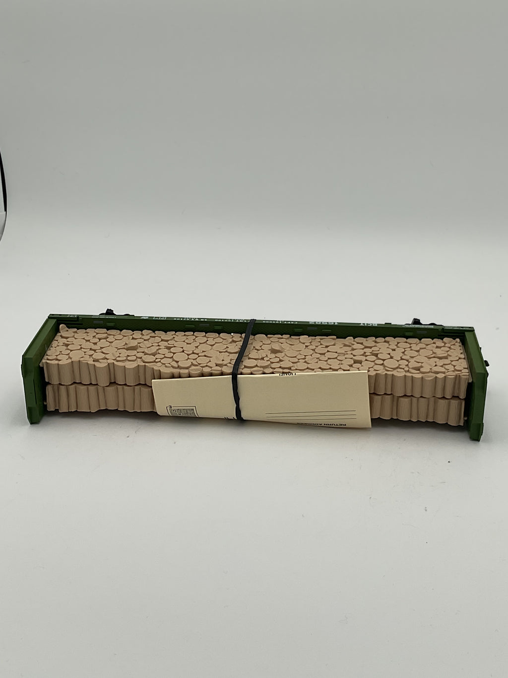 Lionel O 16982 9823 BC Rail Bulkhead Flatcar with Cut Wood Load