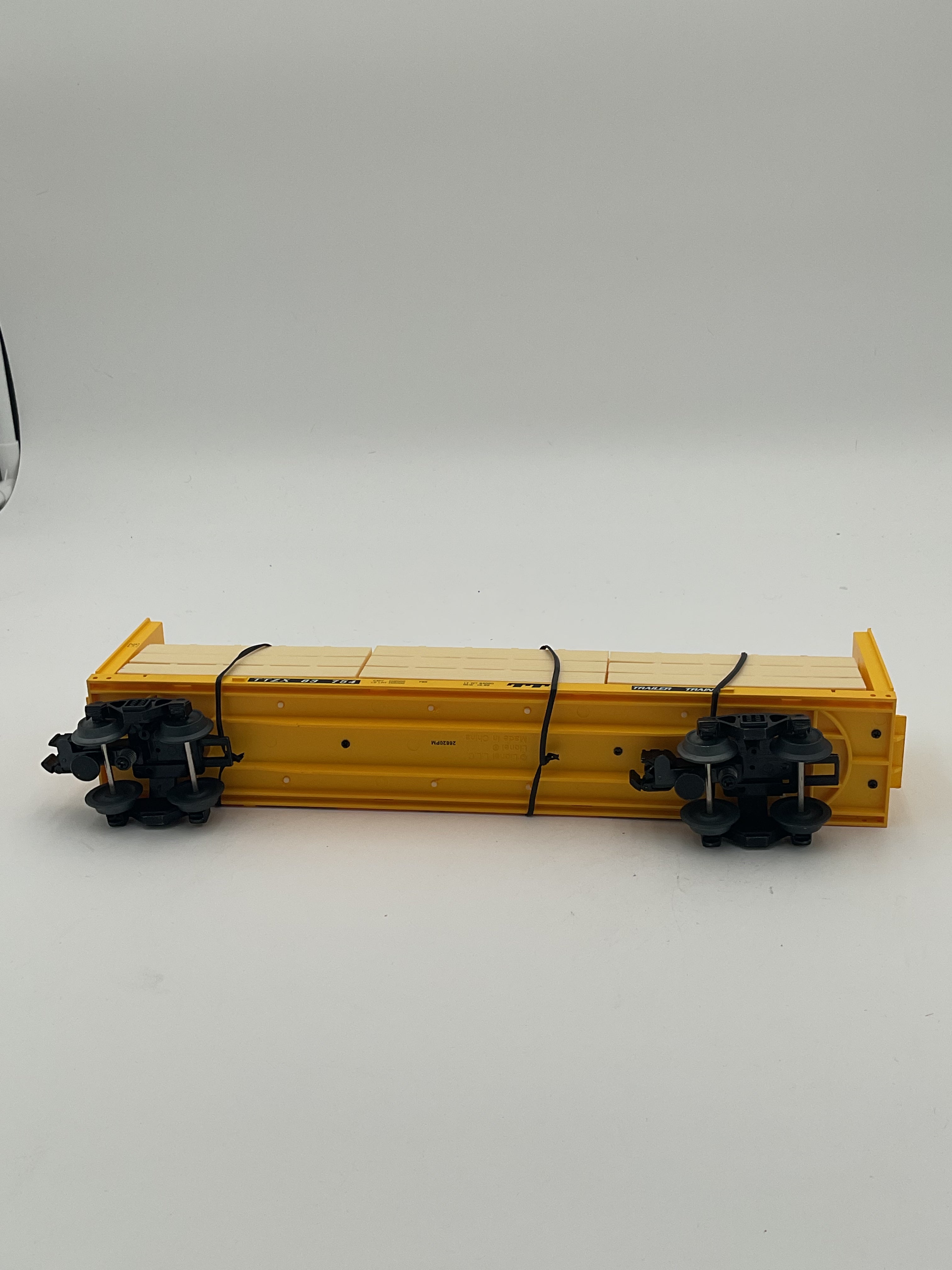 Lionel O 2043063 Trailer Train Standard O Centerbeam Flatcar #83754