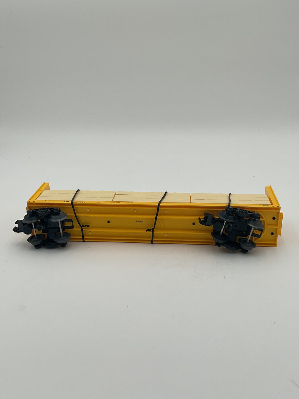 Lionel O 2043051 Milwaukee Road Standard O Centerbeam Flatcar #6300