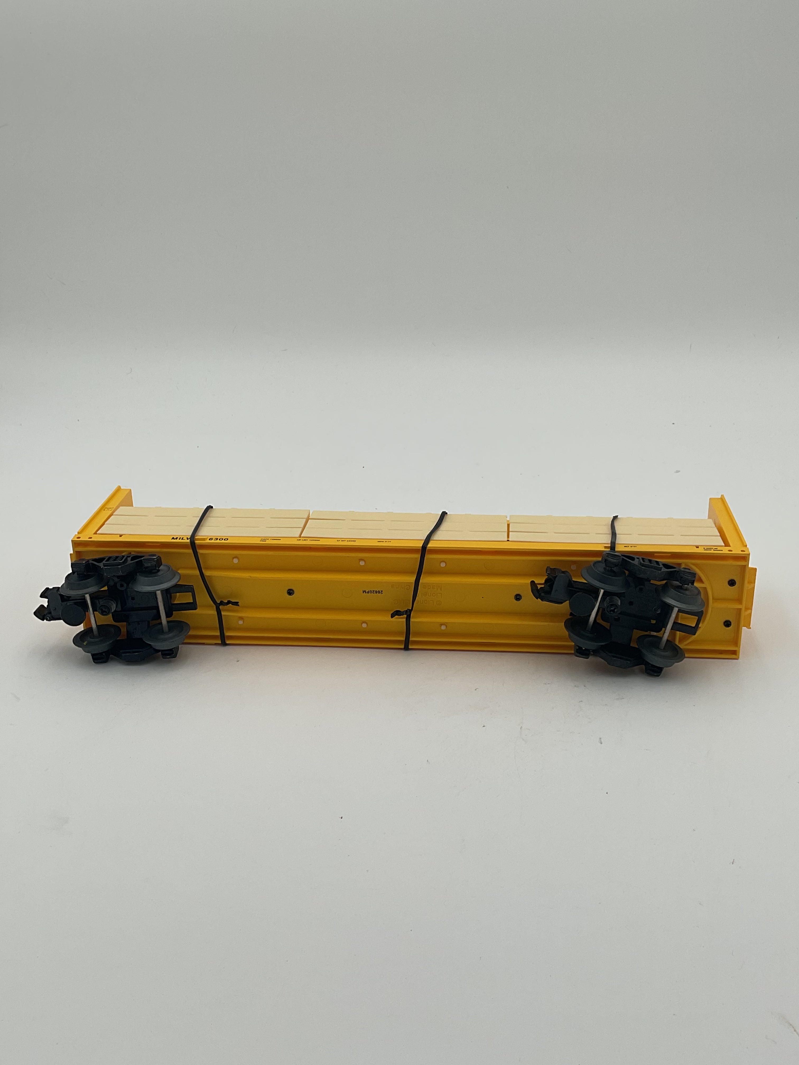 Lionel O 2043051 Milwaukee Road Standard O Centerbeam Flatcar #6300