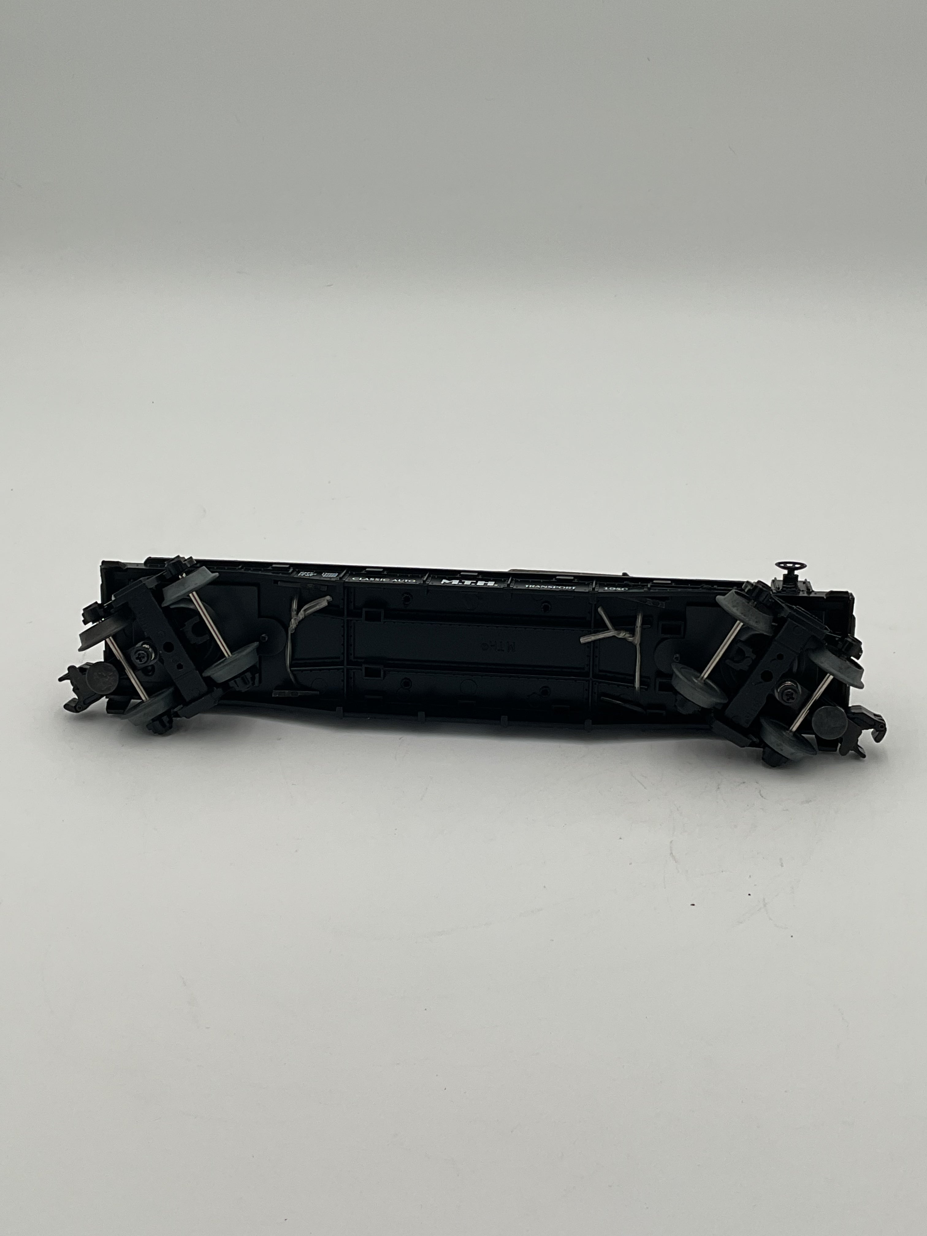 MTH 30-7652 Auto Transport Flatcar w/ Ertl ‘40 Woody Wagons