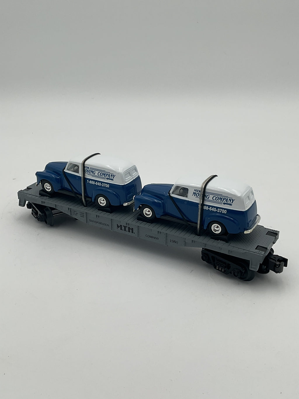 MTH 30-7647 MTH Auto Transport Flatcar w/ Ertl ‘50 Panel Trucks