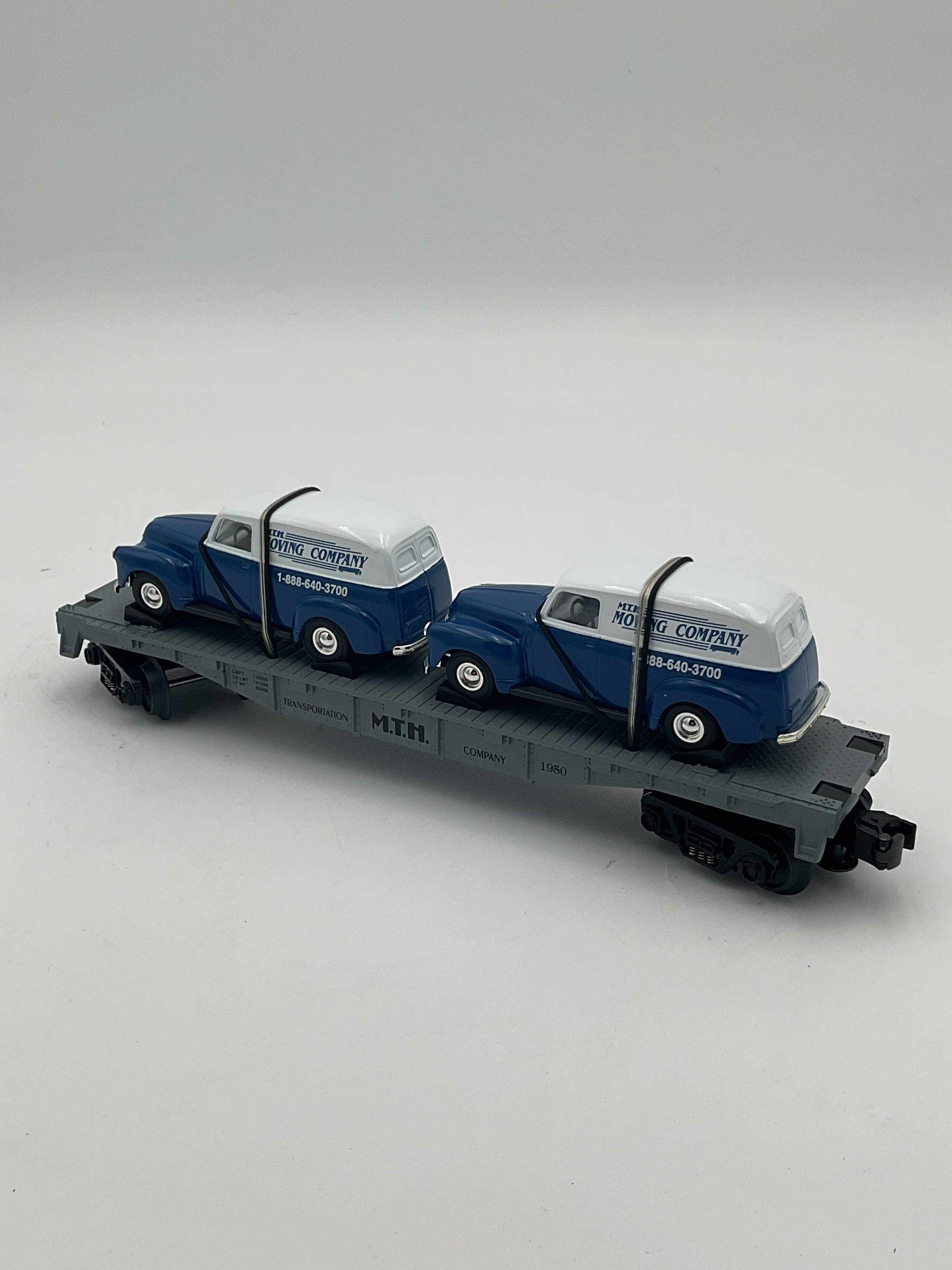 MTH 30-7647 MTH Auto Transport Flatcar w/ Ertl ‘50 Panel Trucks