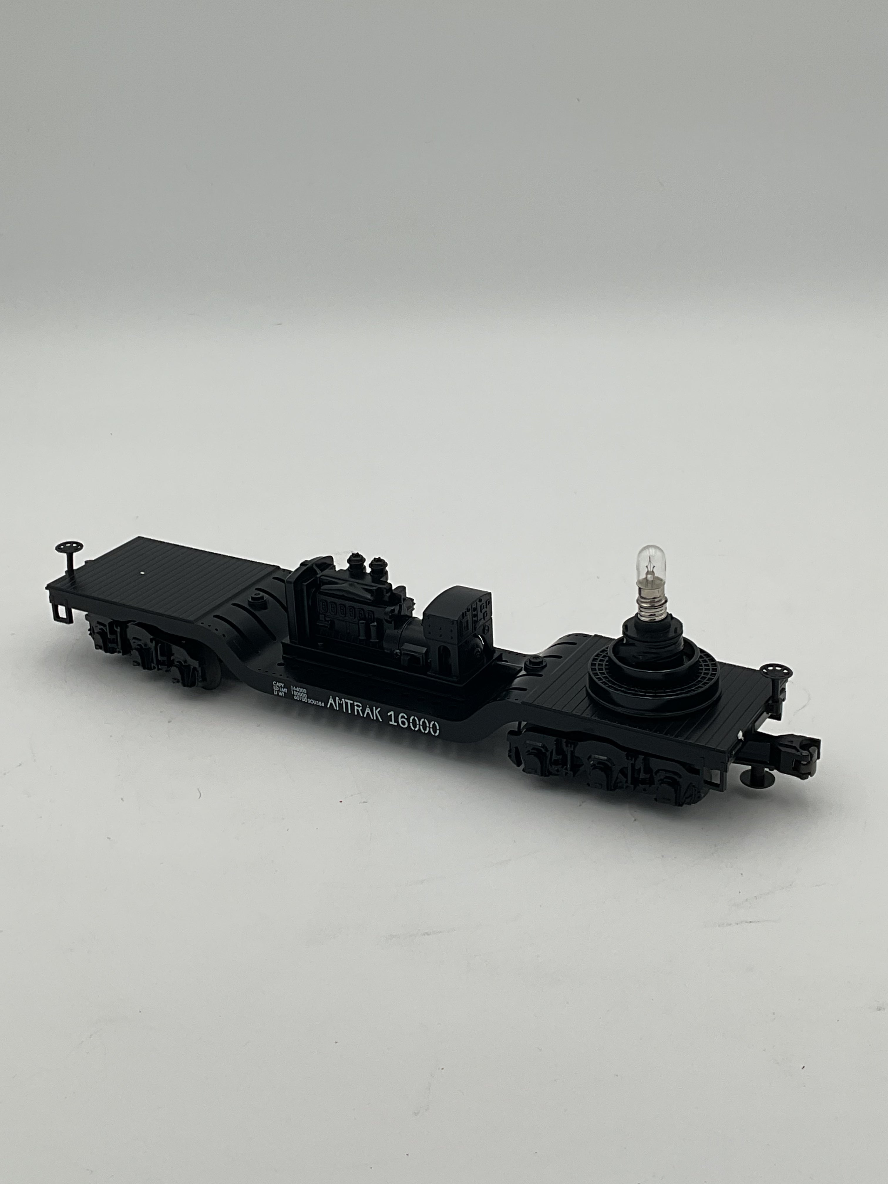 MTH 30-7927 Amtrak Operating Depressed Flat w/ Searchlight